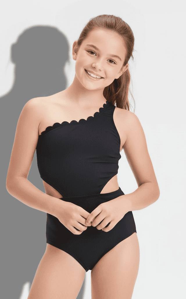 Girls' One-Piece Swimsuit Black ribbed one-shoulder with scallop detail and side cutout.