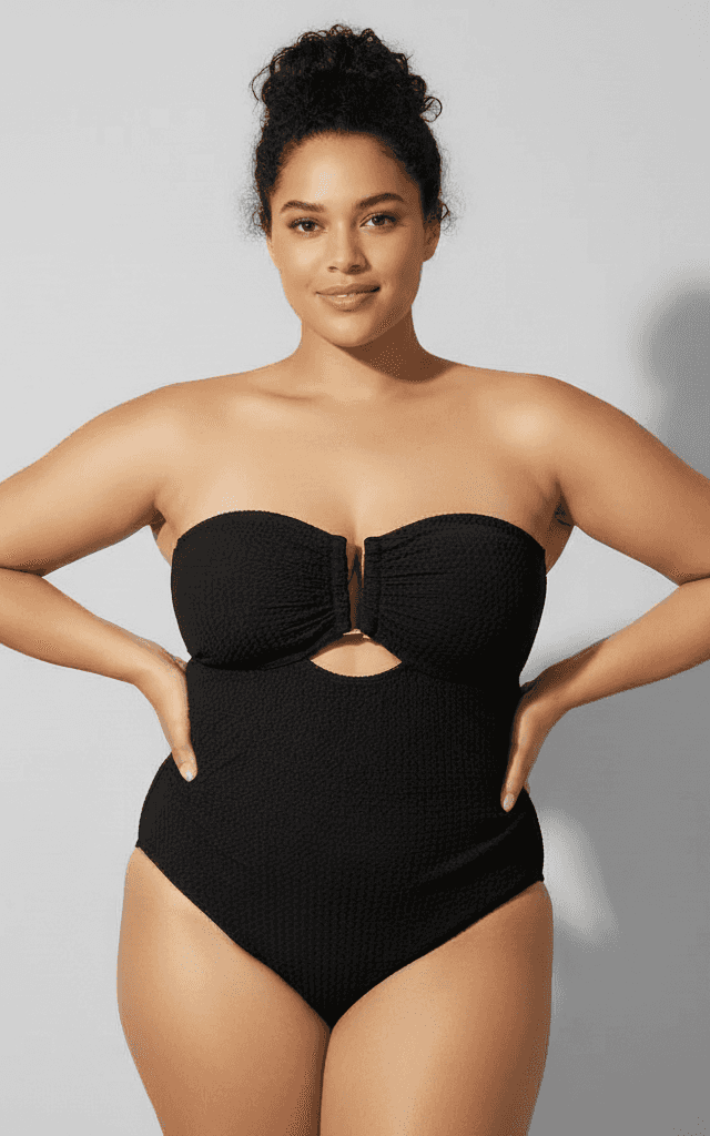 Plus size black textured bandeau one-piece with front keyhole detail and metal clasp closure